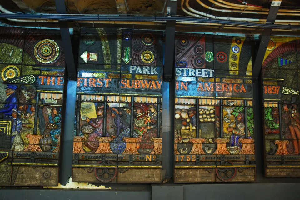 Mosaic window in Boston subway station celebrating America's first subway system.